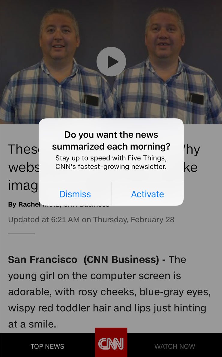 CNN mobile app interrupts users with a popup.